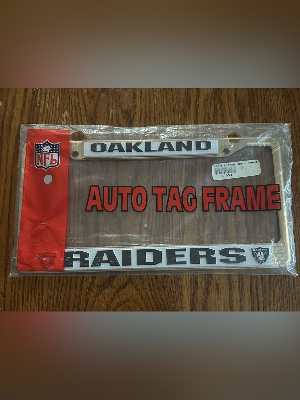Vintage Oakland Raiders Metal License Plate Frame NOS Sealed Gold Plated NFL